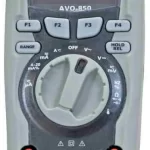 Handheld Megger digital multimeter with a rotary dial, buttons, and red test ports for electrical measurements (voltage, current, resistance).