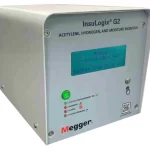 InsuLogix G2 moisture monitor by Megger, a metal enclosure with a blue-green display reading 'System Starting' and status LEDs.